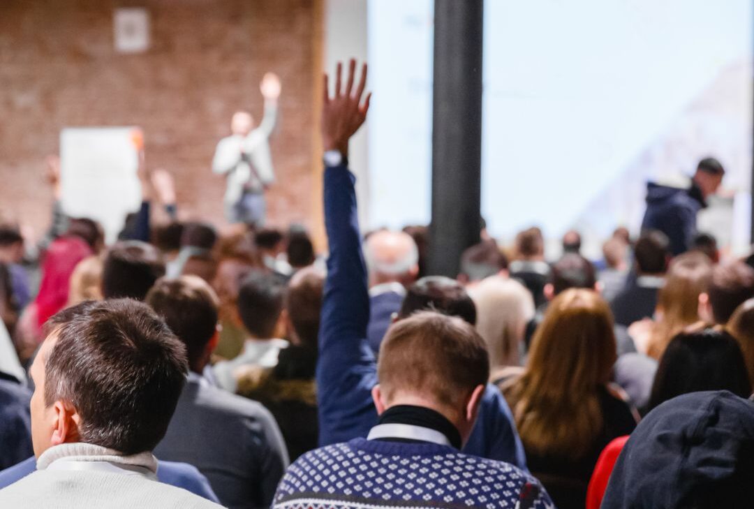 People at a community meeting.
